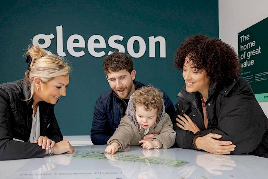 Homeowners choosing their plot in a Gleeson sales centre