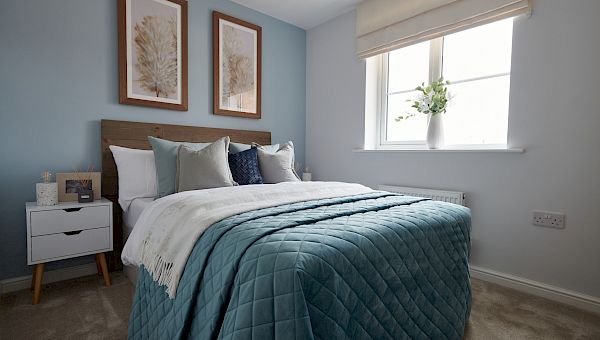 A beautifully designed bedroom in one of our show homes.