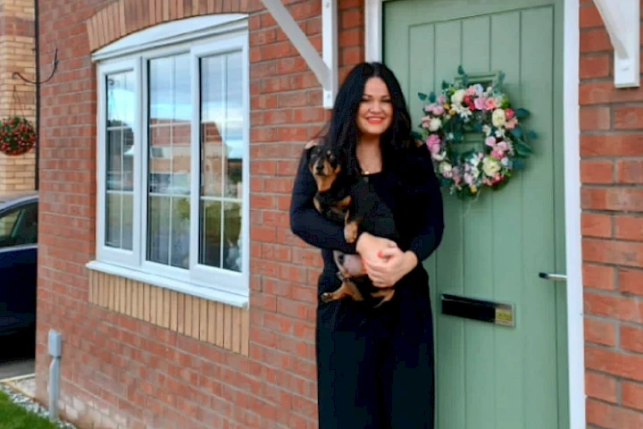 Gleeson customer in front of their home smiling