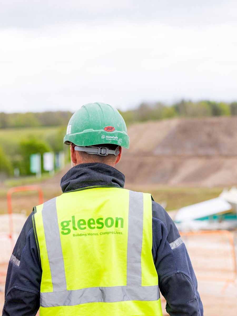 Gleeson construction worker overlooking site