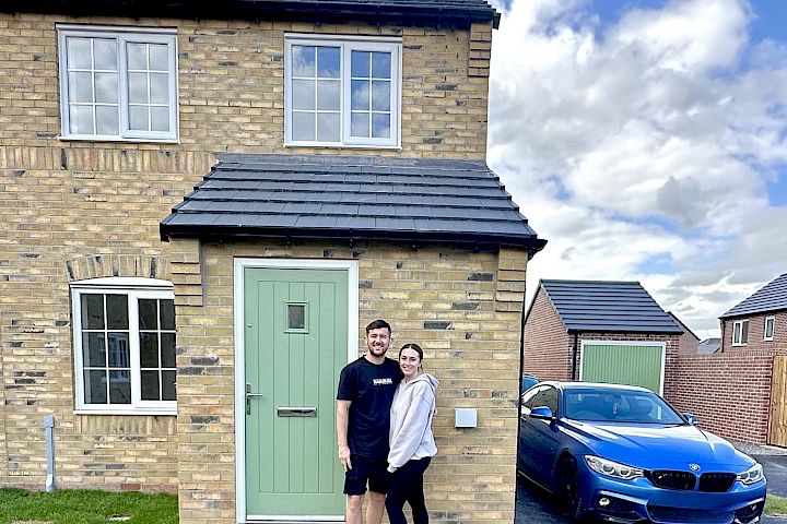 Couple at the front of the house