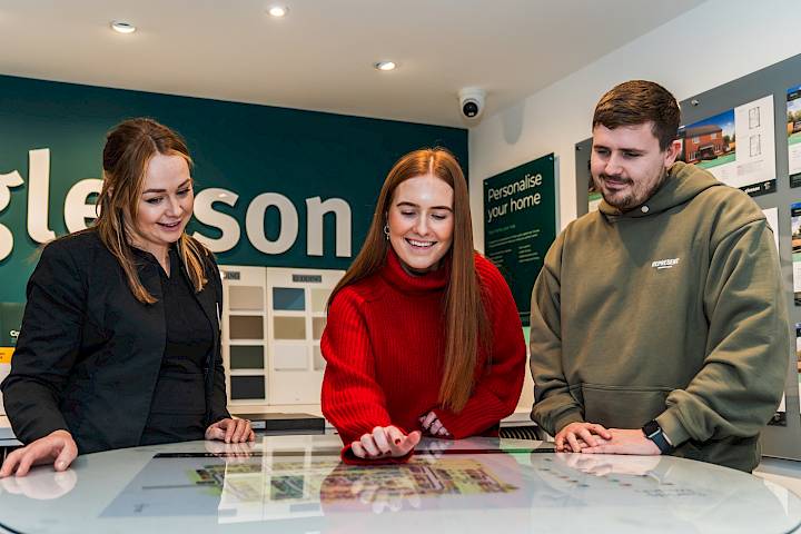 Young couple and Sales Executive in a Gleeson sales centre