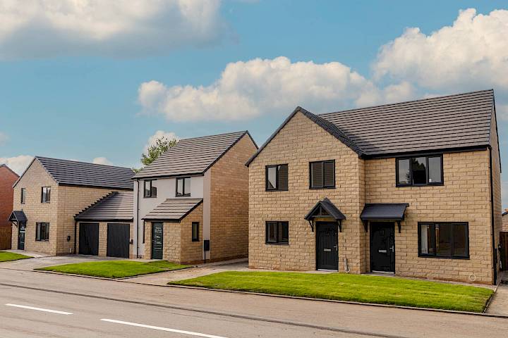 Exterior street scene image of a new build home