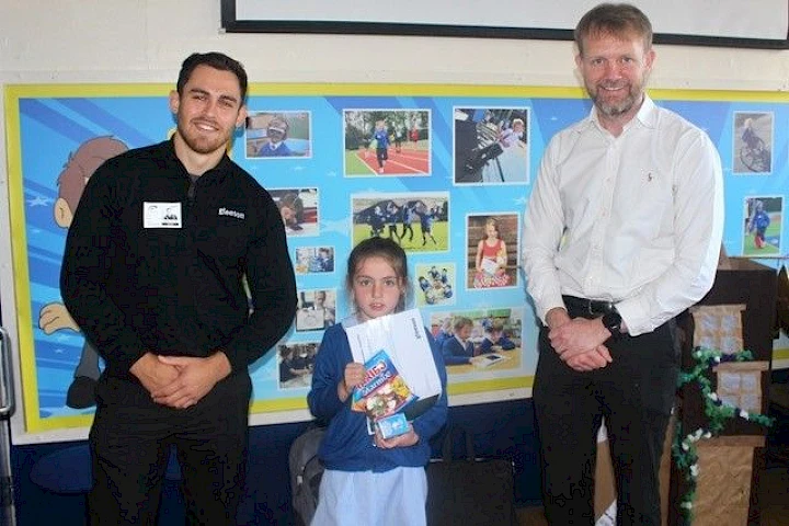 Gleeson staff pictured with Bookwell Primary School student