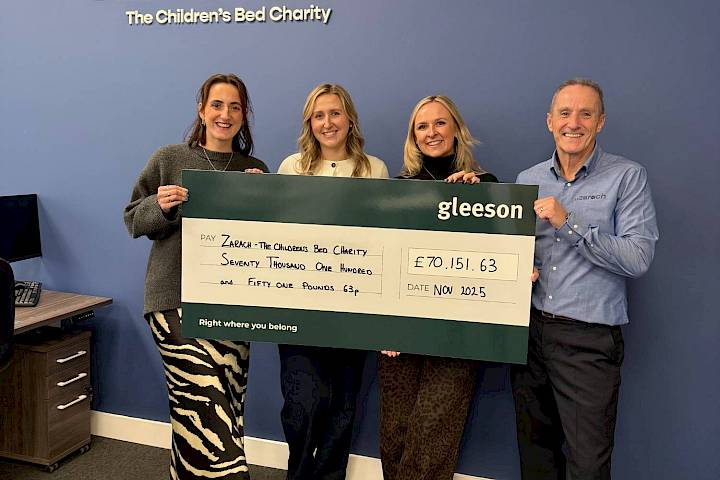 Gleeson colleagues presenting a cheque donation to Zarach the Children's Bed Charity