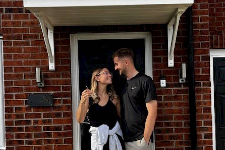 Customers at the front of their home