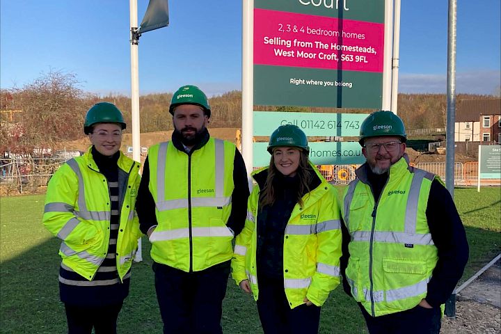 Site team and Olivia Love wearing PPE