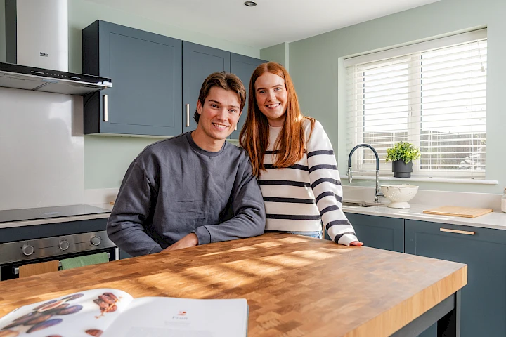 First-time buyer couple in the kitchen