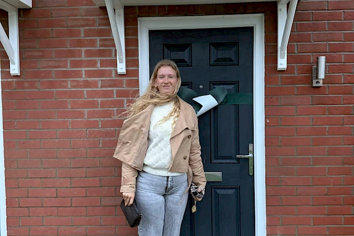 Customer at the front of her home