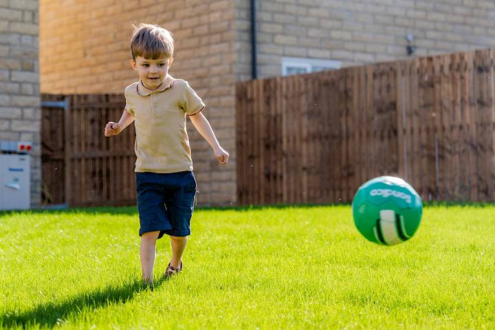 Boy playing football