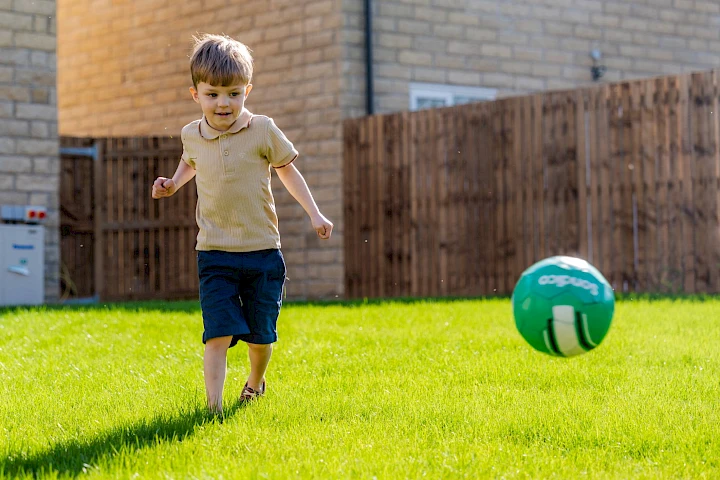 Boy playing football
