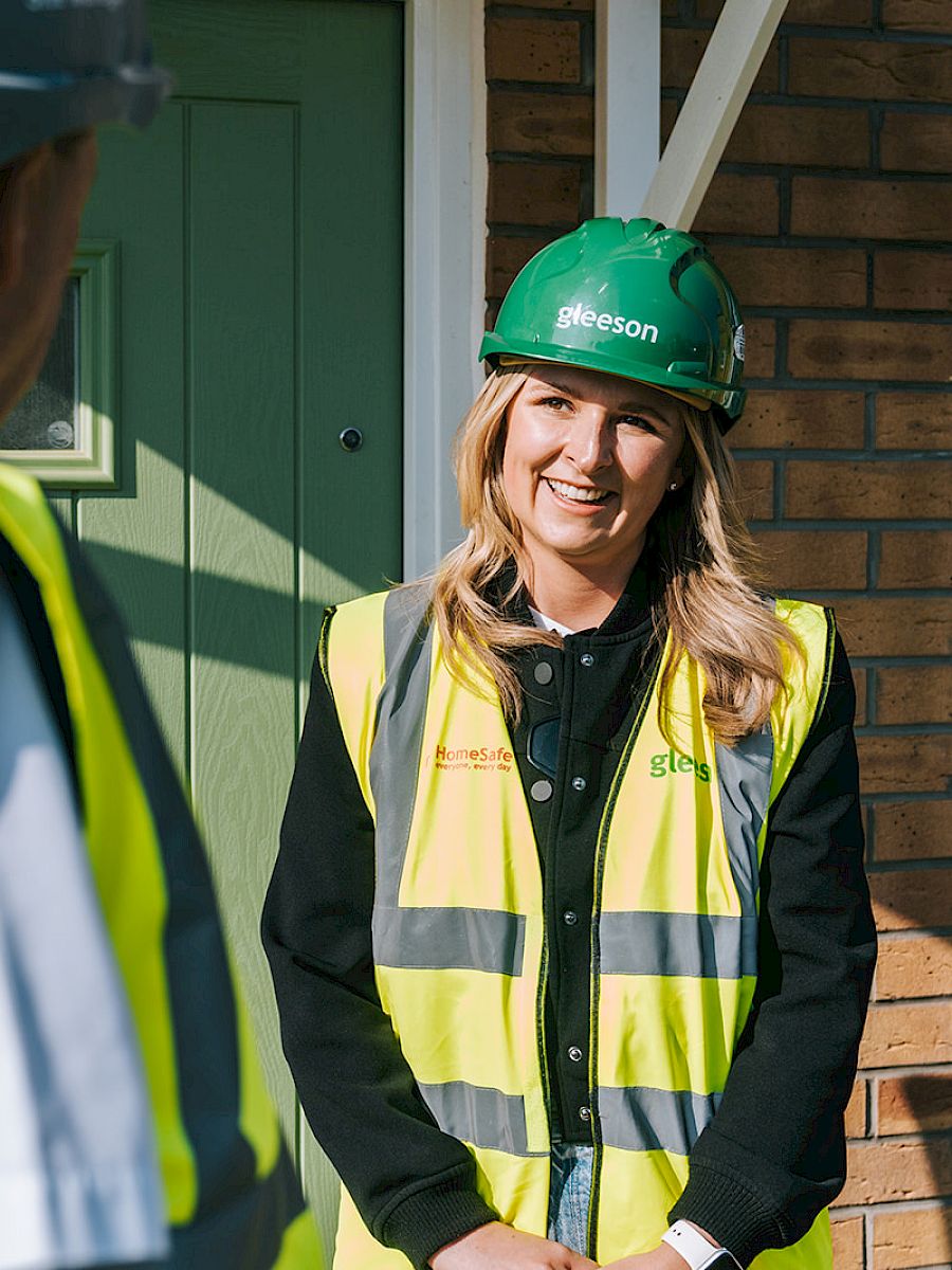 woman smiling in PPE