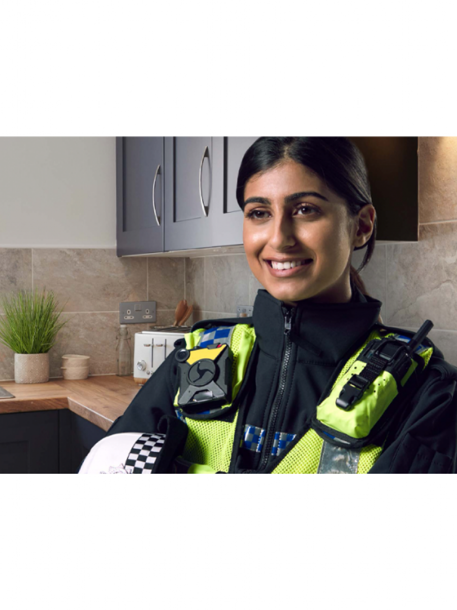 Female police office in her kitchen